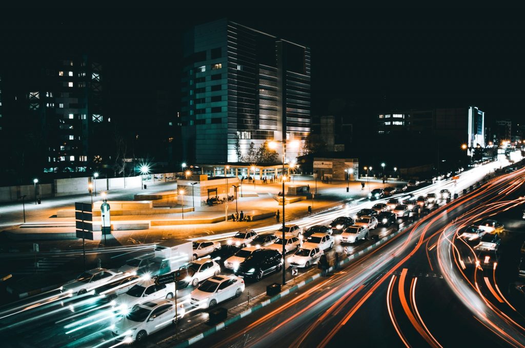 time lapse photography of cars on road during night time